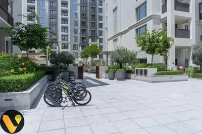 two bikes parked in a courtyard in a building at Vogue Creek Harbour Breeze Creek Beach Waterfront Living Close to Downtown, Burj Khalifa and Dubai Mall, Two Bedroom apartment With Balcony and Private Manmade Beach, Access to all Amenities in Dubai