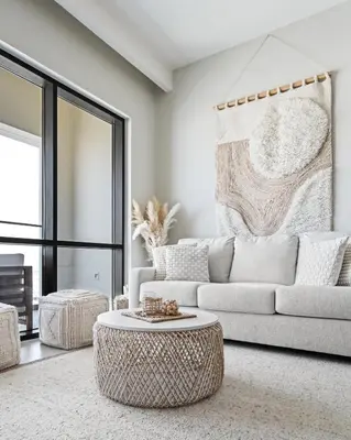 a living room with a white couch and a table at Harbour Oasis - Vida Residences - Creek Harbour in Dubai