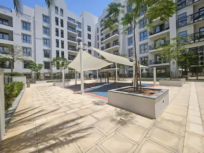 a building with a white tent in a courtyard at Trophy - Discover Tranquility Living in this Sleek Sanctuary in Dubai