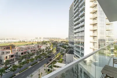 a view from the balcony of a building at Nasma Luxury Stays - Charming Studio at DAMAC Hills Artesia Tower C in Dubai