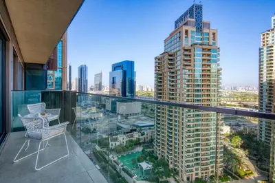 a balcony with a view of a city at Luxury 1BR Apartment in Dubai Marina Gate in Dubai