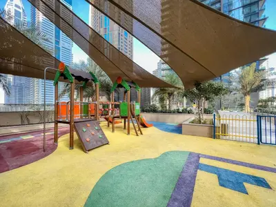 a playground in a building with a playground at Luxury 1BR Apartment in Dubai Marina Gate in Dubai