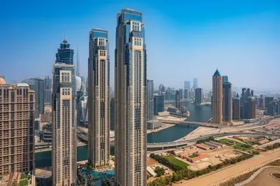 an aerial view of a city with tall buildings at Aykon Luxury Sky Collection Suites with Balcony & Sea View by HSHOME in Dubai