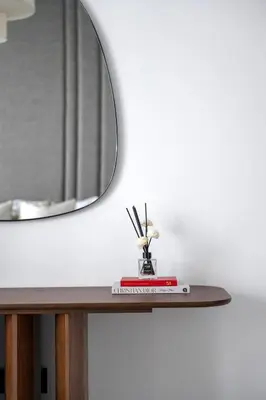 a mirror sitting on top of a table next to a mirror at 2BR Beachfront Gem with Dazzling Views of the Palm in Dubai