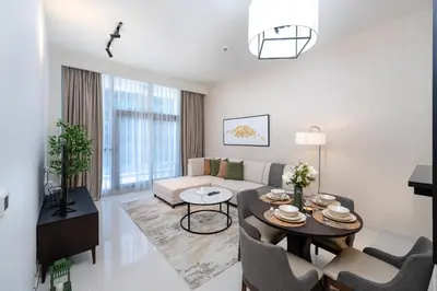 a living room with a couch and a table at Marco Polo - Modern 1BR in Business Bay near Burj Khalifa in Dubai