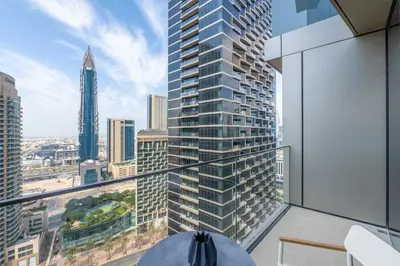 an apartment balcony with a view of a city at Address Dubai Opera Residences in Dubai