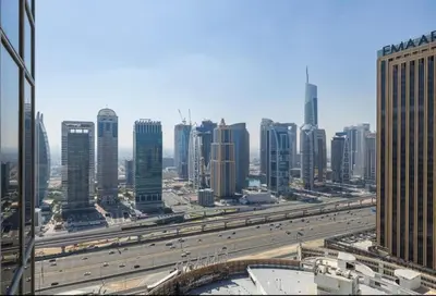 a view of a city with a highway and buildings at One bedroom apartment in JW Marriott Hotel Dubai Marina in Dubai