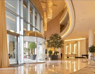 a lobby with a person walking in a building at One bedroom apartment in JW Marriott Hotel Dubai Marina in Dubai
