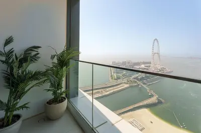 a balcony with plants and a view of the water at Maison Privee - Luxury Living w/ Superb Sea Views in Address JBR in Dubai