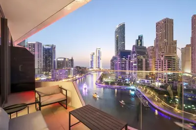 a view of a city skyline from a balcony at Deluxe 1BR Corner Suite with Marina Views in Dubai