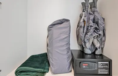 a bag is sitting on top of a microwave at Apartment in Downtown Dubai (Burj Khalifa Views) in Dubai