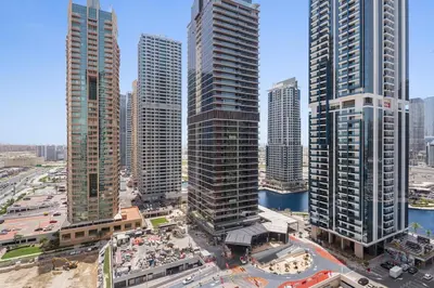 a group of tall buildings in a city at Stonetree - GoldCrest Views 2 - Peaceful Community in Dubai