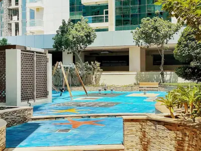 a painting of a playground in front of a building at Brand New 2BHK Luxury Apartment 7min to Dubai Mall 1.5 Bath in Dubai
