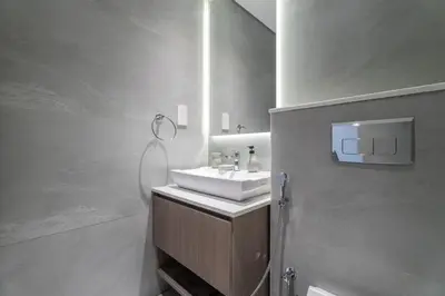 a bathroom with a sink and a mirror at Nasma Luxury Stays - Laya Heights in Dubai