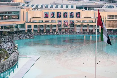 a swimming pool in the middle of a building at Stunning Burj & Fountain Views Luxury 2 BR in Dubai