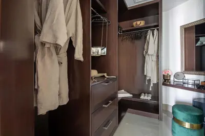a small bathroom with a sink and a mirror at Frank Porter - Opera Grand in Dubai