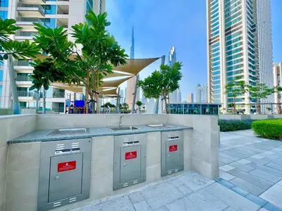 a kitchen with a sink and a counter top at Downtown Views 2BR - Dubai Mall, Fountain & Burj Khalifa access in Dubai