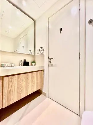 a bathroom with a shower and a sink at Downtown Views 2BR - Dubai Mall, Fountain & Burj Khalifa access in Dubai