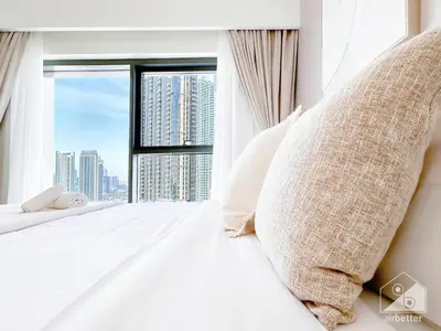 a hotel room with a view of a city at Luxurious Living in 2B with Burj & Fountain Views in Dubai