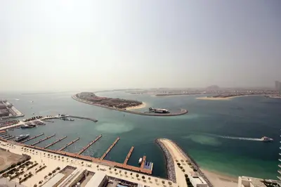 an aerial view of a large body of water at Incredible Sea view 2BHK - Private beach Access - Emaar Beachfront in Dubai