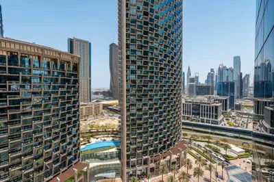 a view of a tall building in a city at GuestReady - Downtown Dubai luxurious stay in Dubai