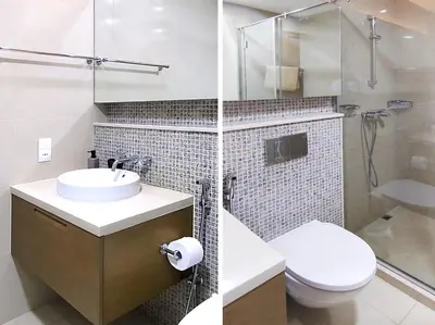 a bathroom with a sink and a toilet and a shower at Claren Tower 2 - Downtown by Golden Casa in Dubai