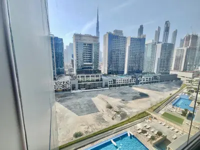 a view of a city skyline from a window at Lux BnB I Vera Residences I Burj Views in Dubai