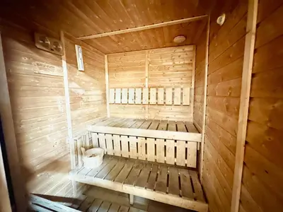 an overhead view of a wooden sauna at Wonderful 1BR Apt with Marina view in Dubai