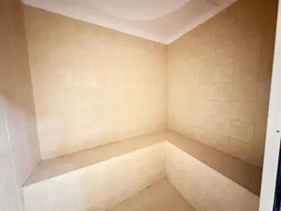 a bathroom with a tub in the corner at Wonderful 1BR Apt with Marina view in Dubai