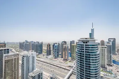 an aerial view of a city with tall buildings at Delightful 2BR Apartment in VIDA Residences Dubai Marina by Deluxe Holiday Homes in Dubai