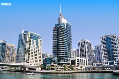 a view of a city with a river and buildings at bnbmehomes - DAMAC Waves Tower in Dubai