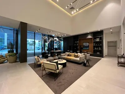 a large living room with couches and chairs at Modern Studio Downtown DT1, Walk to Dubai Mall, Burj View & Metro in Dubai