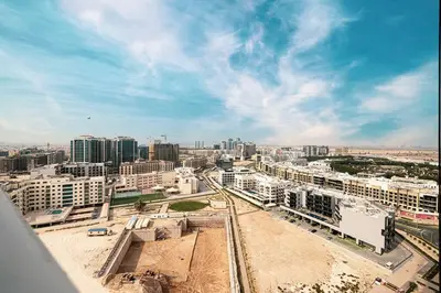 an aerial view of a city with buildings at Studio - Miraclz Tower in Arjan in Dubai