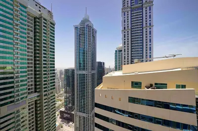 a view of a city skyline with tall buildings at Lux 2BD apartment, Steps to the Beach in the Heart of Dubai Marina - Elite Residence Tower in Dubai