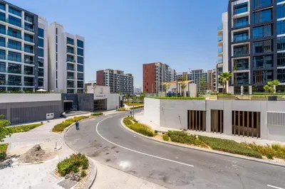 an empty street in a city with tall buildings at GuestReady - Downtown Dubai luxurious living in Dubai