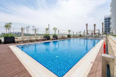 a swimming pool on the roof of a hotel at GuestReady - Downtown Dubai luxurious living in Dubai