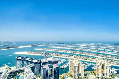an aerial view of a harbor with a marina at Iconic One Bedroom Panoramic Palm Views in Dubai