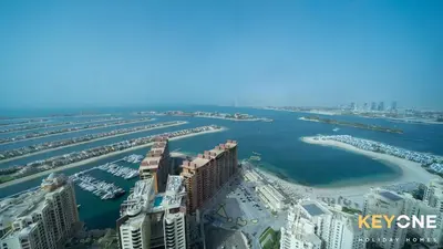 an aerial view of a marina in a city at Iconic One Bedroom Panoramic Palm Views in Dubai