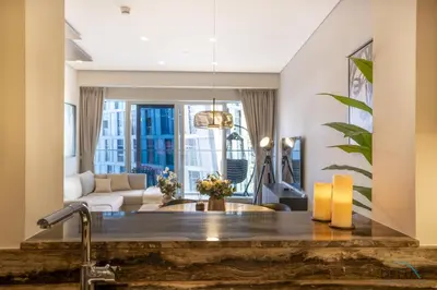 a living room with a sink and a living room at Charming 1BR in Damac Heights, Dubai Marina by Deluxe Holiday Homes in Dubai