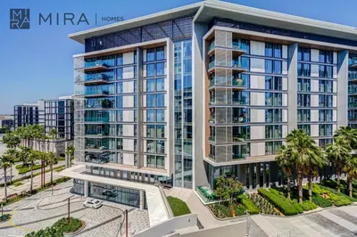 an aerial view of a large building with palm trees at Mira Holiday Homes - Luxury 2 bedroom in Bluewaters with stunning view in Dubai