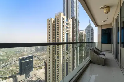 a view of a city from the balcony of a building at StoneTree - High Floor - Prime location in Dubai