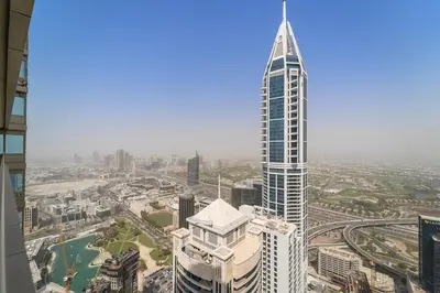 a view of a tall building in a city at StoneTree - High Floor - Prime location in Dubai