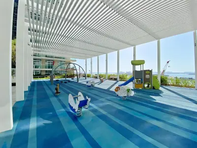 a view of a playground in a building at Spacious 2 BHK next to the Beach - Sunrise Bay in Dubai