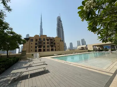 a swimming pool on the roof of a building at Burj Royale Condo, Close to Dubai Mall & Attractions in Dubai