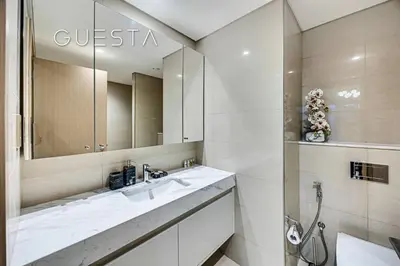 a bathroom with a sink and a mirror at Burj Royale - Burj Khalifa View, Downtown Dubai in Dubai