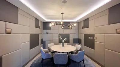 a dining room with a table and chairs at SmartStay at Opera Grand - Stunning Burj Khalifa Views - Brand New Luxury Residences in Dubai