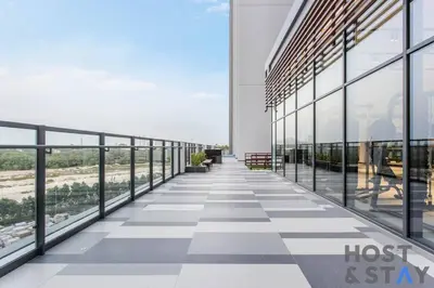 a walkway on the top of a building at Central 1BR Apartment at Wilton Park - Host & Stay in Dubai