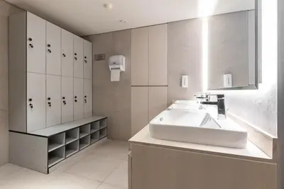 a bathroom with a sink and white cabinets at Condor Marina Star, Dubai Marina by SIMPLY COMFORT in Dubai