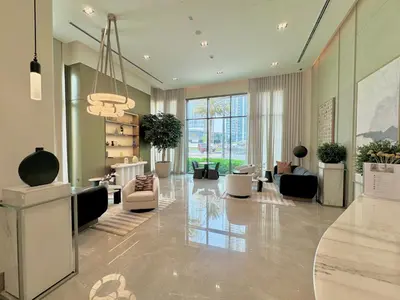 a living room with a lobby with couches and chairs at New Elegance at Burj Crown downtown Balcony & View in Dubai