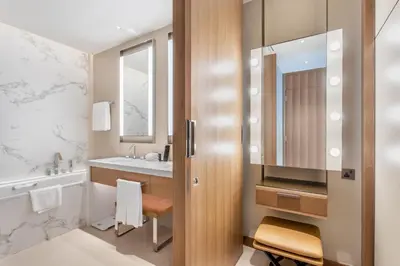 a bathroom with a sink and a mirror at Address Dubai Opera Residences by The S Holiday Homes in Dubai